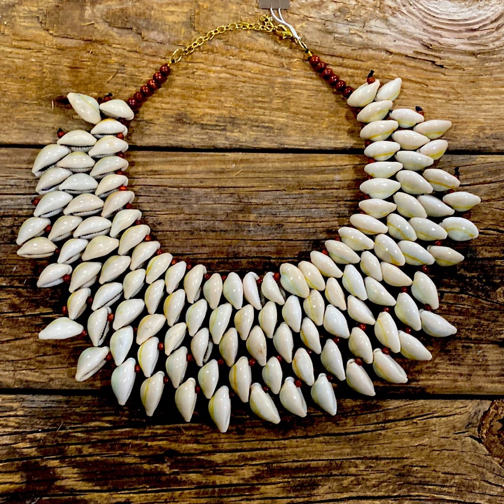Shell Necklace by Natasha. Never worn. Adjustable. Get ready for summer.